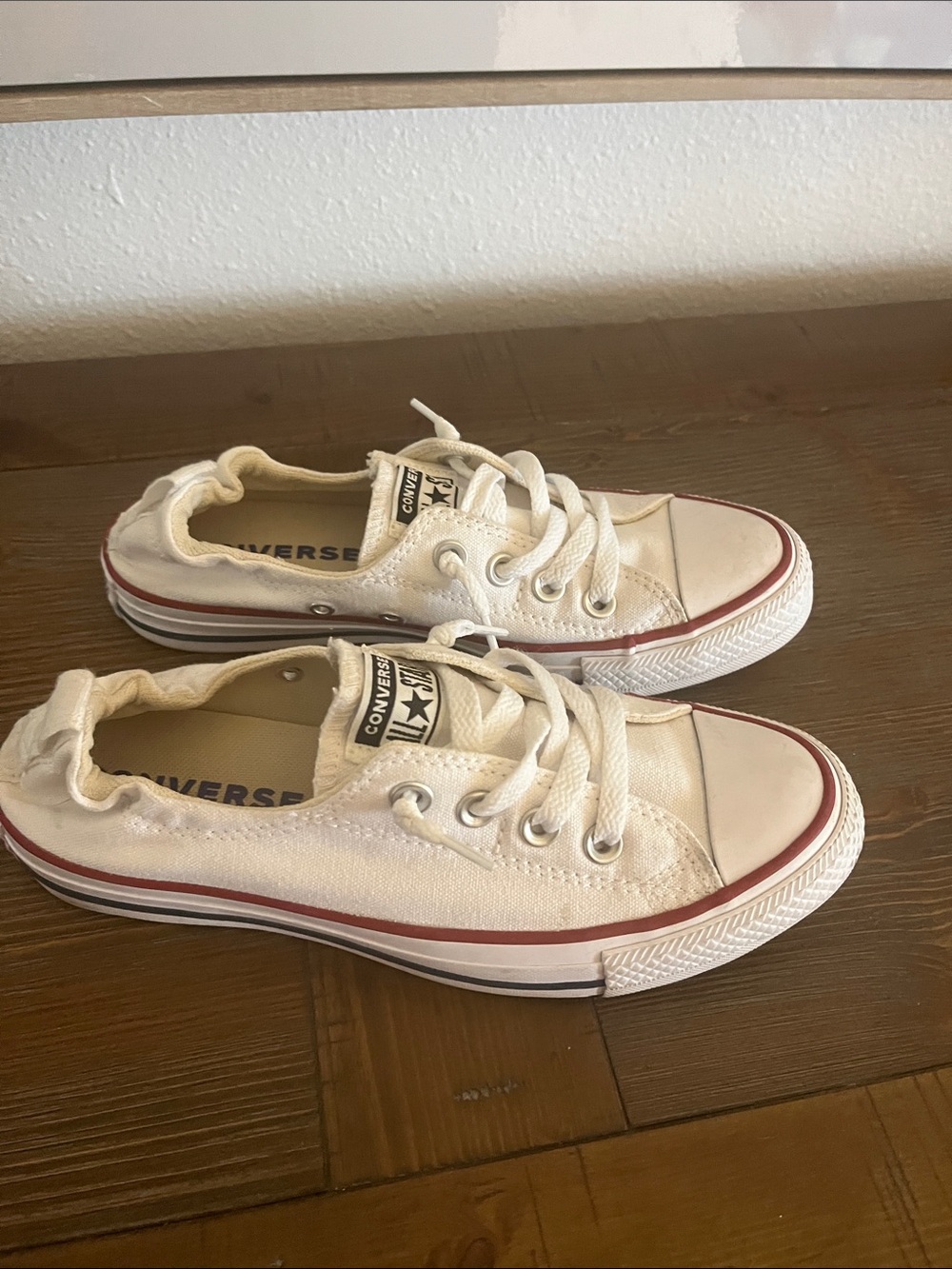 Converse White Slip On Canvas Low-Top Sneakers with Red Trim